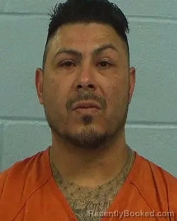 Mugshot of Jonathan Garza Martinez booked in Williamson County, Texas on March 18, 2026