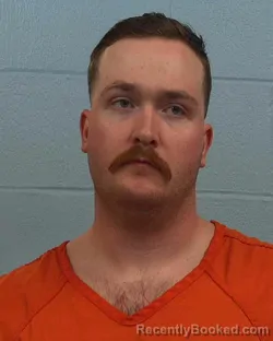 Mugshot of Emmett Grey Comstock booked in Williamson County, Texas on April 1, 2026