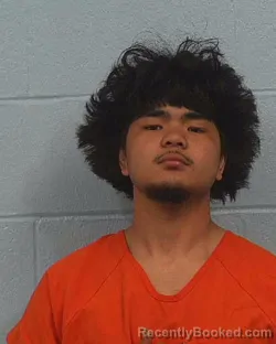 Mugshot of Issac White Flores booked in Williamson County, Texas on April 25, 2026