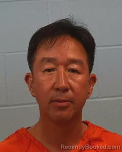 Mugshot of CHEOL WOO LEE booked in Williamson County, Texas on May 10, 2026