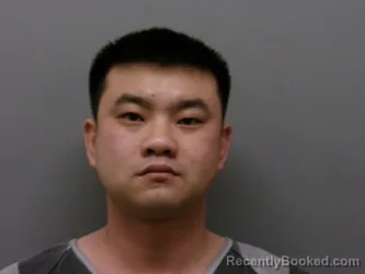 Mugshot of WEIQIANG XUE