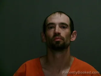 Mugshot of JUSTIN ROBERT THOMPSON