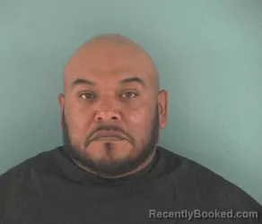 Mugshot of VALENTINE MARTINEZ booked in Okeechobee County, Florida on June 15, 2026