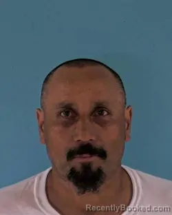 Mugshot of PEDRO ARTURO MUNGRAY booked in Okeechobee County, Florida on April 25, 2026