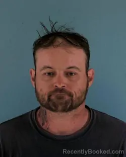 Mugshot of JOHN WOLFE SCOTT booked in Okeechobee County, Florida on April 26, 2026