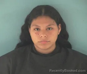 Mugshot of ROSALINDA MARTINEZ TORRES booked in Okeechobee County, Florida on April 29, 2026