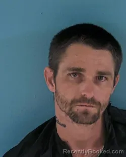 Mugshot of TRAVIS EUGENE BUTTS booked in Okeechobee County, Florida on March 20, 2026