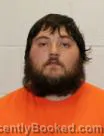 Mugshot of Sheldon Aaron Coulter booked in Atchison County, Kansas on October 16, 2026