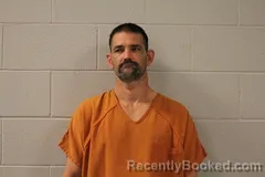 Mugshot of JOHN W EVANS booked in Bourbon County, Kansas on May 4, 2026