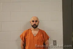 Mugshot of NIKITA SURGUY booked in Bourbon County, Kansas on June 2, 2026