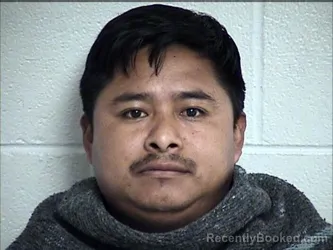 Mugshot of ROBERTO SANTIS-GOMEZ