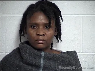 Mugshot of DELINA EXILHOMME