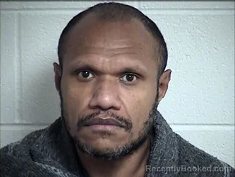 Mugshot of MAX HANS BENONI AROBAYA