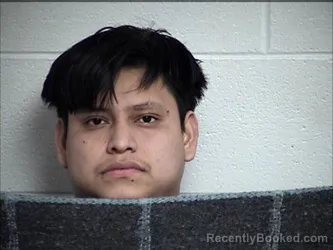 Mugshot of AXEL CAO-CAAL