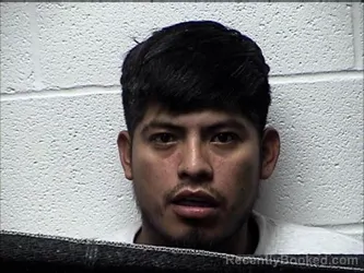 Mugshot of JUAN CARRASO CRUZ