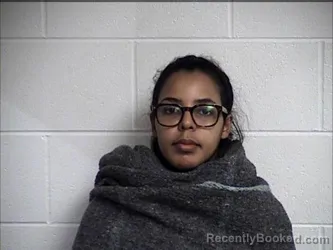 Mugshot of VALERIA IFIGENIA MOREIRA MELO booked in Chase County, Kansas on March 17, 2026