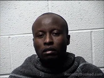 Mugshot of DENNIS CHEBON KIBOWEN booked in Chase County, Kansas on March 18, 2026