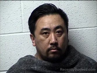 Mugshot of SINH LAVONGSA booked in Chase County, Kansas on March 19, 2026