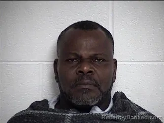 Mugshot of ERIC ZANNOU booked in Chase County, Kansas on March 19, 2026