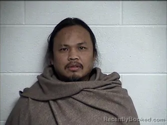 Mugshot of SANEXAY SOPHAPHONE booked in Chase County, Kansas on March 27, 2026