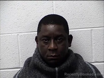 Mugshot of HEZRON CHIBU OCHWERI booked in Chase County, Kansas on April 2, 2026