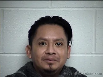 Mugshot of OSEAS ACABAL-AJANEL booked in Chase County, Kansas on April 30, 2026