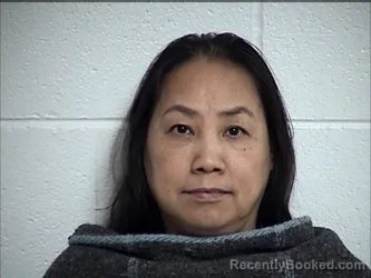 Mugshot of DONGHUA LIU booked in Chase County, Kansas on May 1, 2026