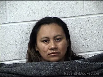 Mugshot of ENMA ROSARIO RODRIGUEZ IGLESIAS booked in Chase County, Kansas on July 11, 2026