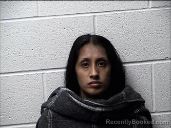 Mugshot of MARIA SALMERON MARTINEZ booked in Chase County, Kansas on August 1, 2026