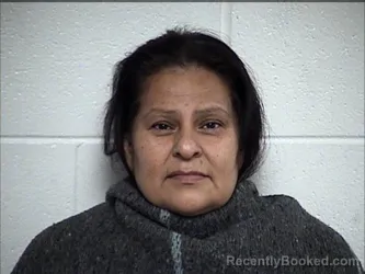 Mugshot of Maria Del Rosario Lozano-Hernandez booked in Chase County, Kansas on August 13, 2026