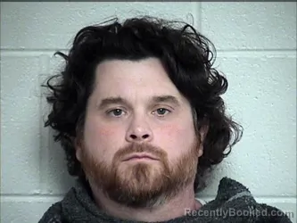 Mugshot of Simon Gordon Burns booked in Chase County, Kansas on August 28, 2026
