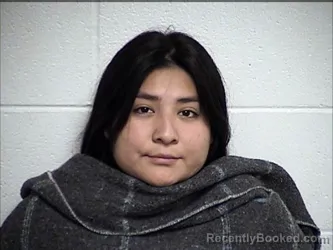 Mugshot of Mariana Alexandra Dewey booked in Chase County, Kansas on September 1, 2026
