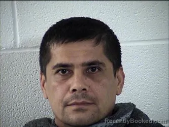 Mugshot of Sukhrob Salimovich Khamraev booked in Chase County, Kansas on October 9, 2026