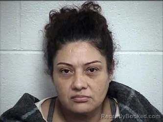 Mugshot of Gloria Garcia-Benitez booked in Chase County, Kansas on October 10, 2026