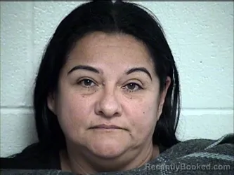 Mugshot of Jeanette Xiomara Parada-Bautista booked in Chase County, Kansas on October 16, 2026