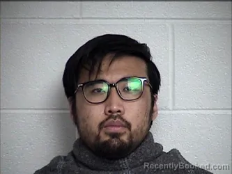 Mugshot of Yongjian Xu booked in Chase County, Kansas on October 22, 2026