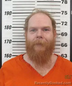 Mugshot of RYAN E WIDBY