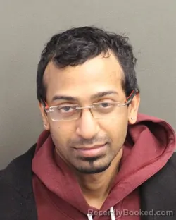 Mugshot of MICHAEL TILLAK RAMOUTAR