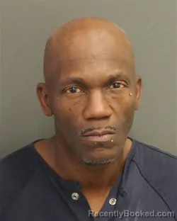 Mugshot of MANWEL ROSADO