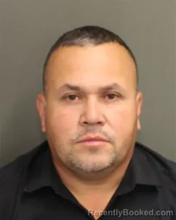 Mugshot of MELVIN R MACHADOARTOLA