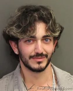 Mugshot of DANIEL ENRIQUE MIGUEL