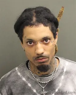 Mugshot of MICHAEL DANIEL REYES