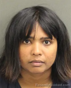 Mugshot of XORA OUTINELLA LU PERSAD