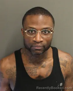 Mugshot of DOMINIQUE JAMAL TOLBERT