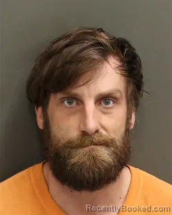 Mugshot of ADAM TREVOR WOMACK