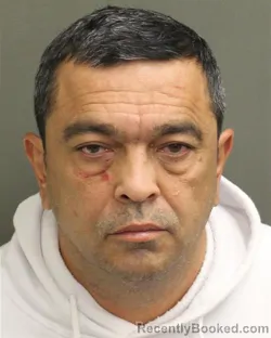 Mugshot of MUZAFFAR M SUFIKHUJAEV