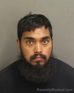 Mugshot of JUSTIN AARON RAMSNAMY