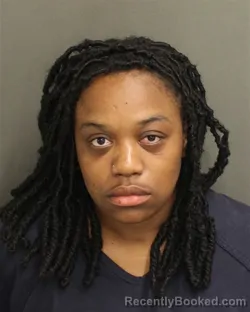 Mugshot of CHRISTIAN JANITA HAMPTON booked in Orange County, Florida on April 2, 2026