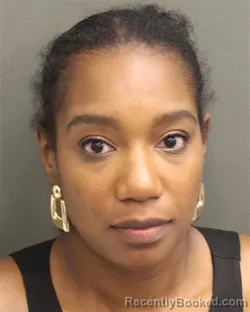 Mugshot of FRIEZI FRANCISCA DORVILUS booked in Orange County, Florida on April 2, 2026