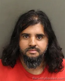 Mugshot of DANIEL COELHODEOIVEIRA booked in Orange County, Florida on April 15, 2026
